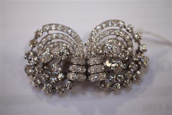 A 1930s/1940s platinum and diamond set double clip brooch, 2.25in.